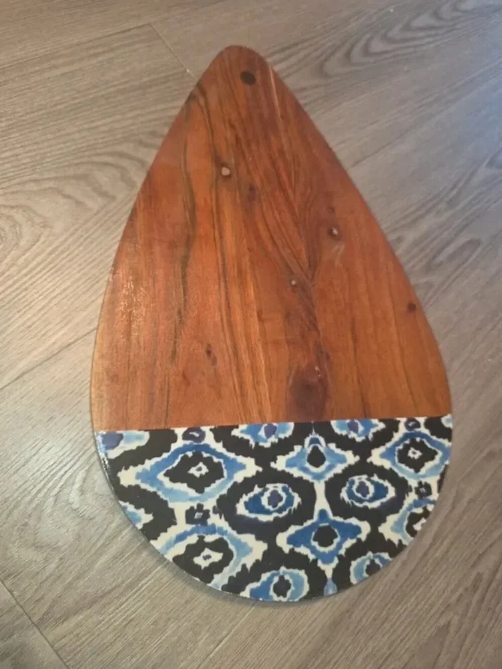 Wood and resin decorative cutting board, teardrop/surfboard shape with ikat patt